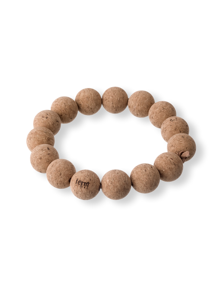 Cork Coaster made of round cork beads on a string, seen from above