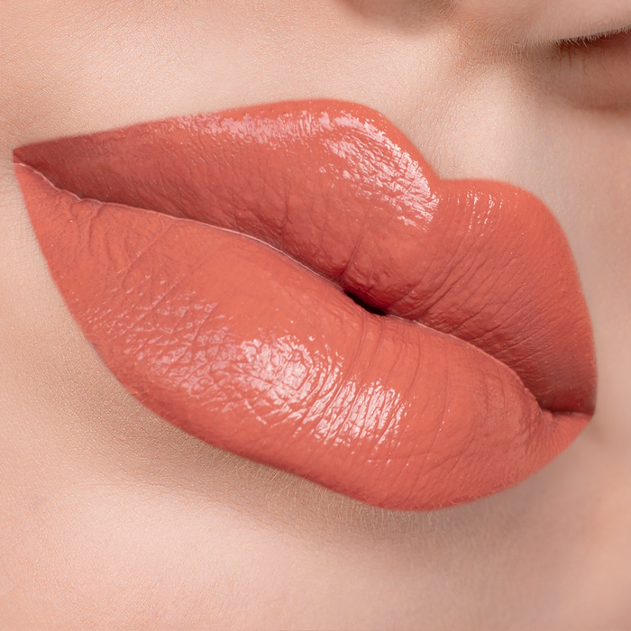 Dreamy terracotta nude lipstick on lips, light skin tone close-up