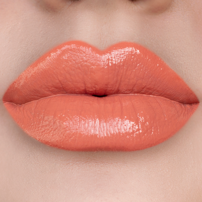 Dreamy terracotta nude lipstick on lips, light skin tone