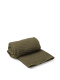 Organic Bath Towel in olive, folded with waffle texture