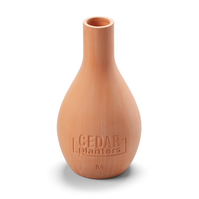 Wooden vase with 'Cedar Planters' branding on a white background
